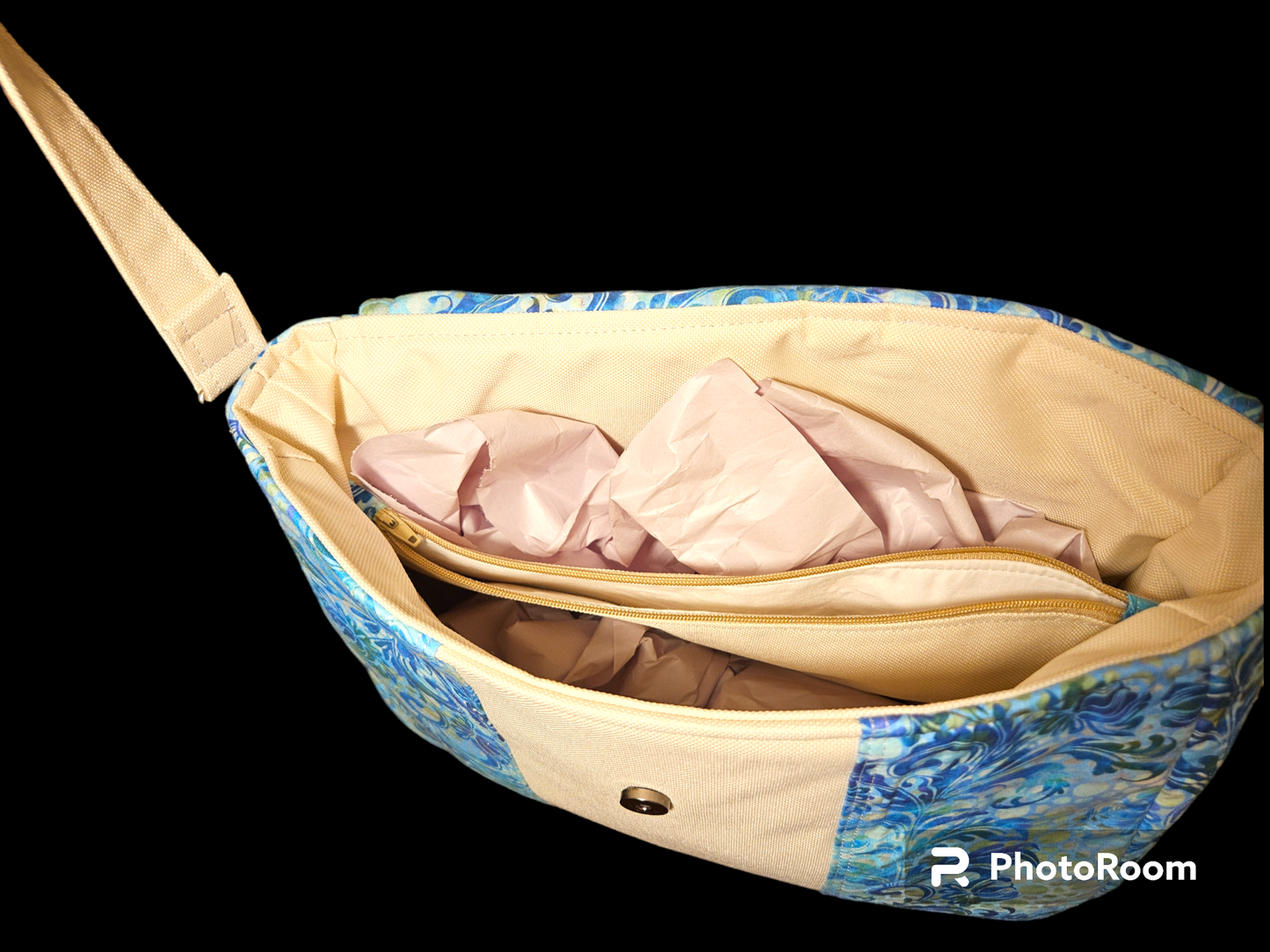 Blue floral messenger bag with divider pocket